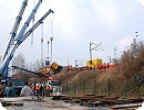 [Der umgestrzte Flachwagen in der Verbindungskurve]